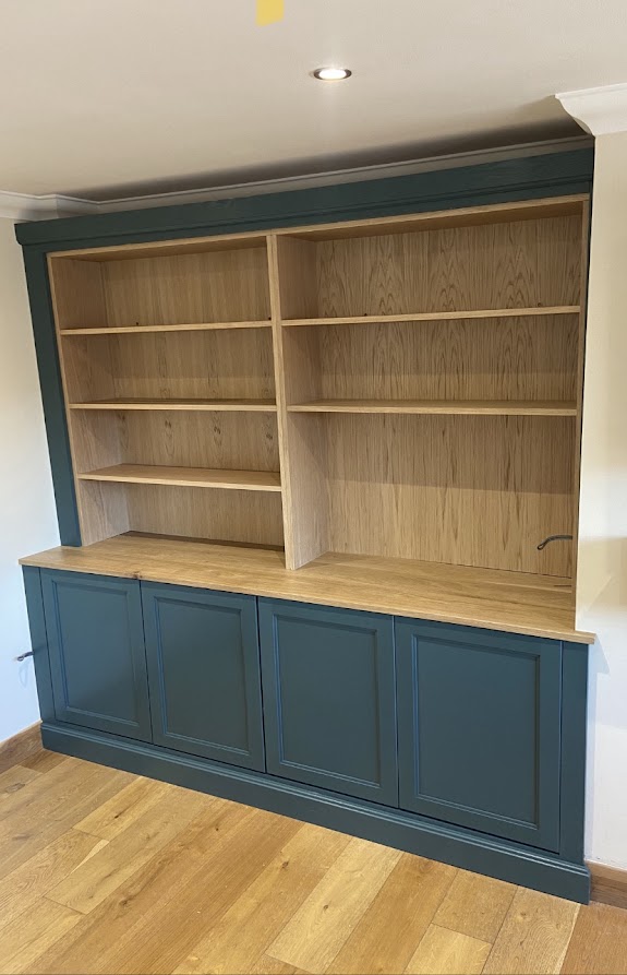 bespoke bookshelves with cabinet under